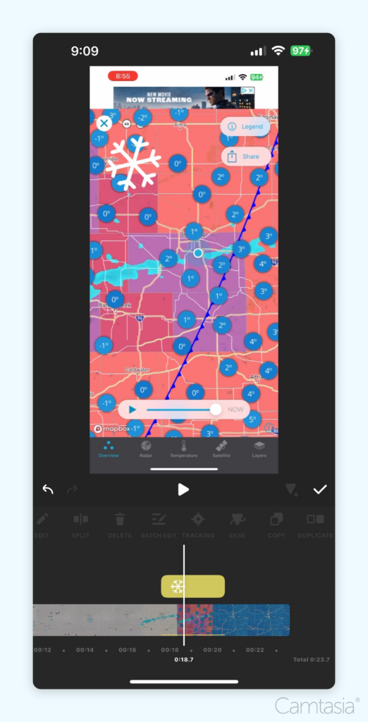 The InShot mobile editing app interface displaying a vertical timeline at the bottom and a preview window of a weather map with a snowflake symbol. The interface includes tools for editing, splitting, and adding effects.